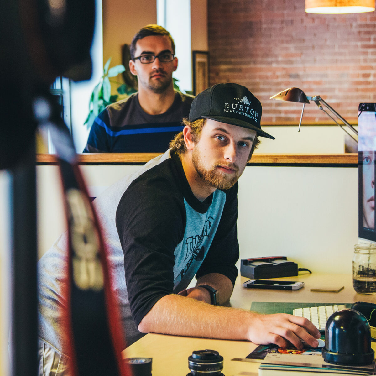 graphics design student at internship with Burton Snowboards